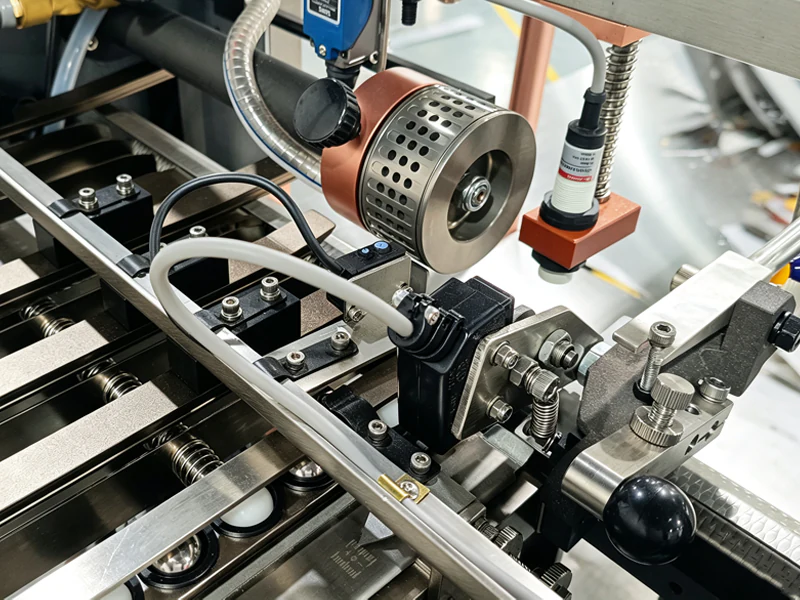 Vacuum suction wheel and sheet feeding assembly